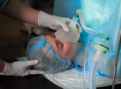woman getting anesthesia before surgery