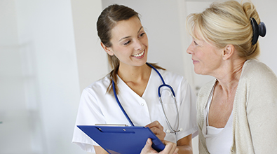 nurse with woman patient