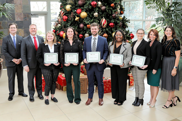 A group photo of Tanner leadership team members and award recipients