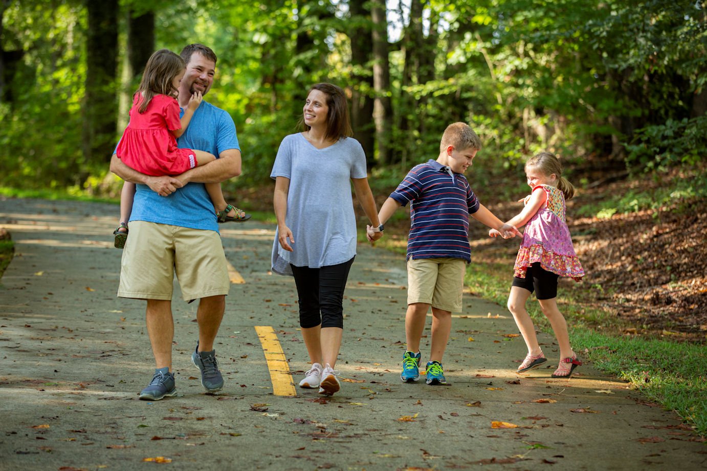 Amanda Riggins and family on walking trail