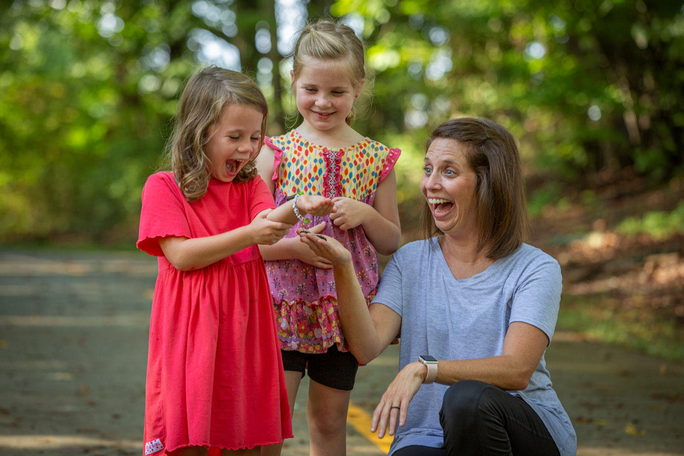 Riggins with hew two daughters