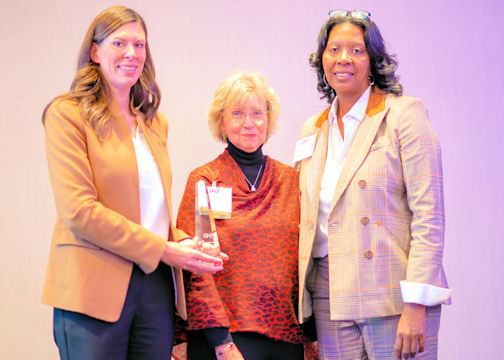 Georgia Hospital Association (GHA) President and CEO Caylee Noggle, left, and GHA Chair Mary Chatman, right, presented Tanner’s retired chief nursing officer, Deborah Matthews, RN, with the organization’s James Shepherd Lifetime Achievement Award. 
