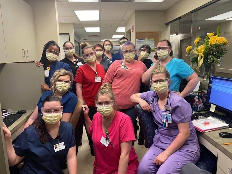 4 East nurses wearing masks