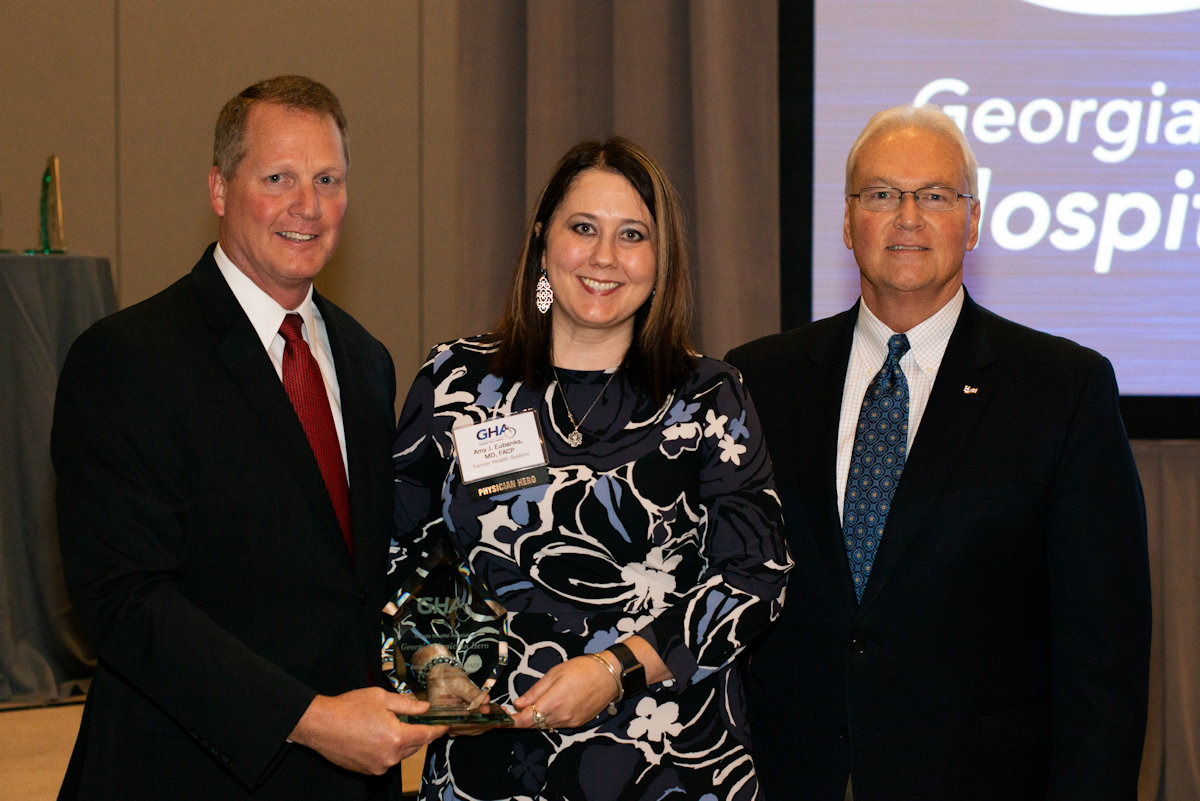 Dr. Amy Eubanks with GHA officials