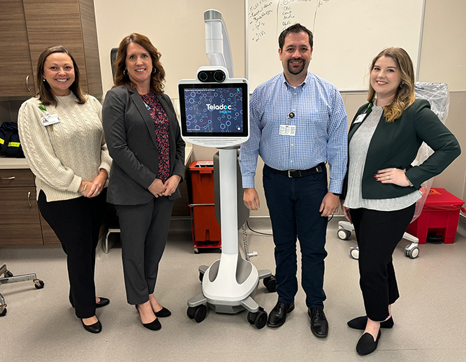 Tanner staff pictured with TelaDoc stroke robot