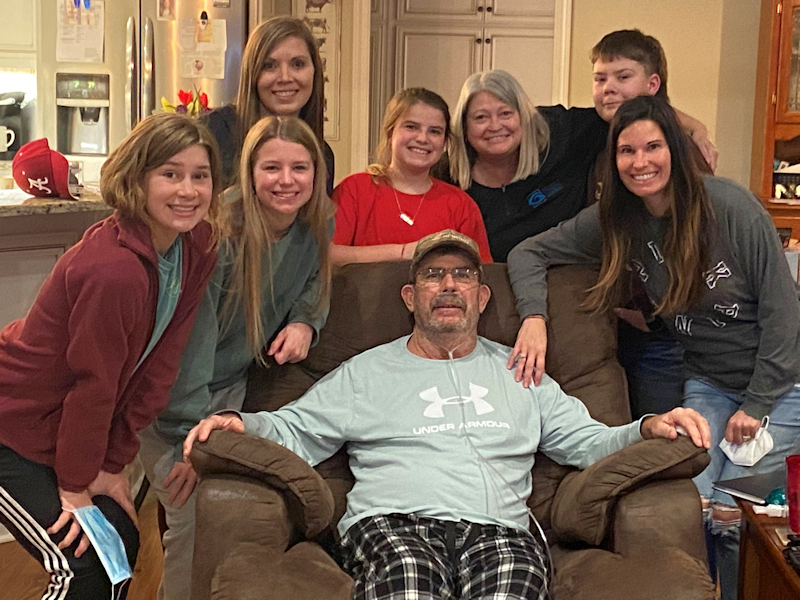 Pictured with Mike Shinn, from left to right, are Sadie Stallings; Emma Shoemaker; Michelle Stallings; Willow Shoemaker; his wife, Tina Shinn; Sawyer Stallings; and Christina Shoemaker.