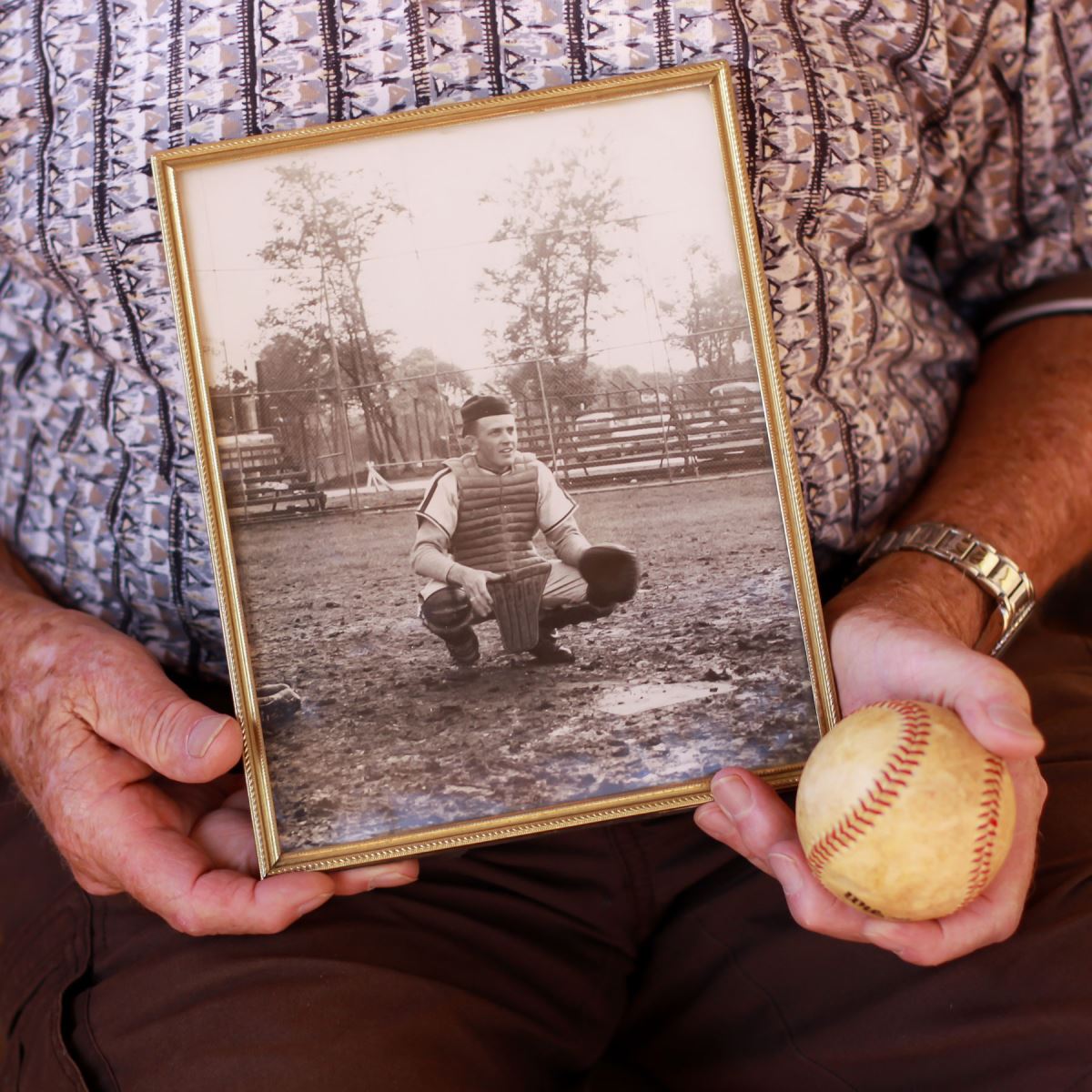 Lowell Elliott with baseball and picture