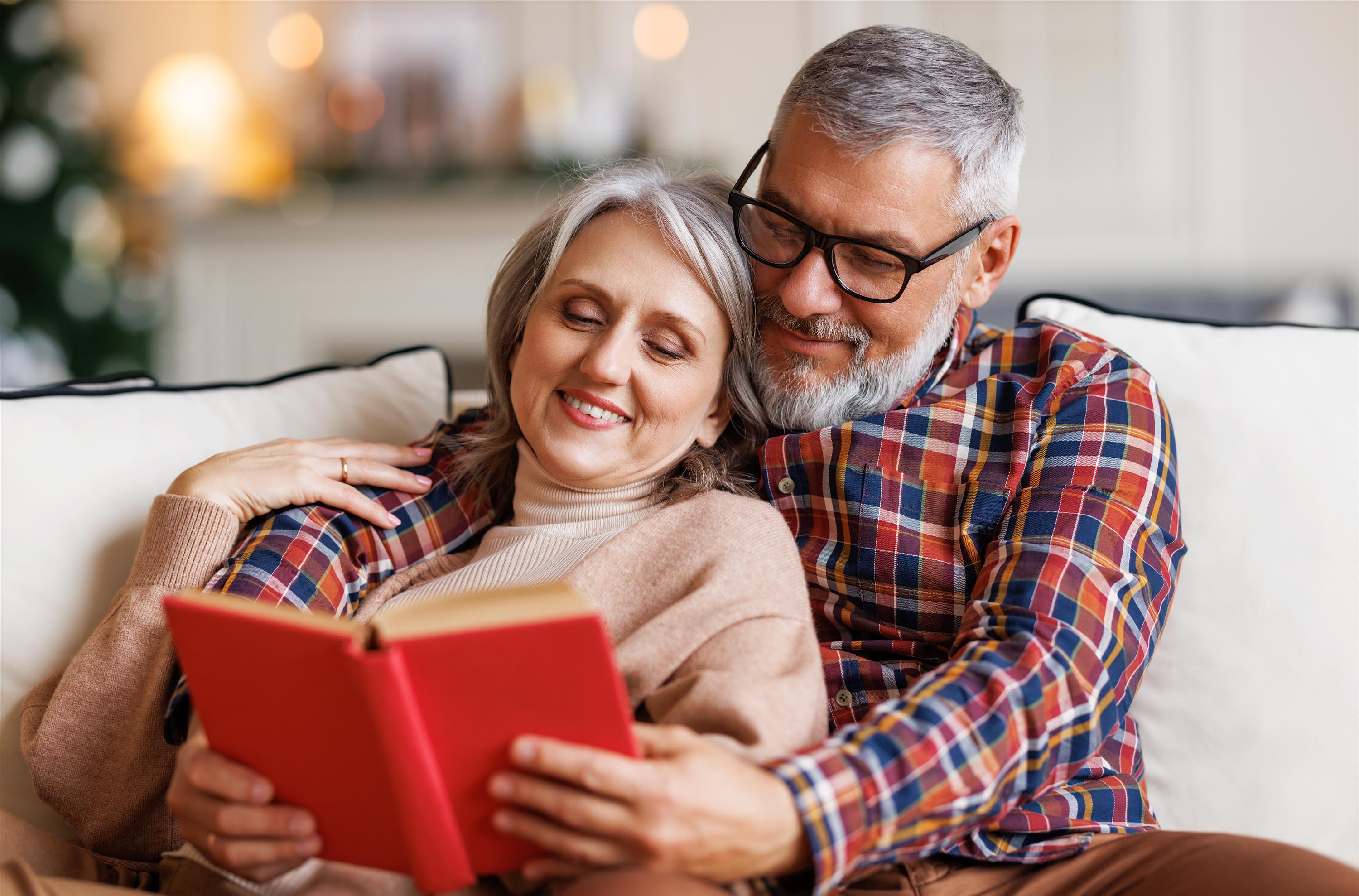 Husband and wife reading book
