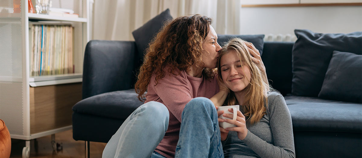 Two women sitting together