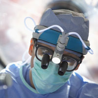 Photo of a surgeon with eye wear.