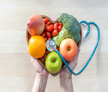 healthy food in a bowl with stethoscope