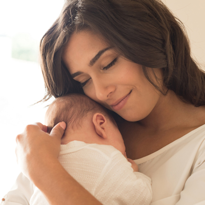 mom holding newborn